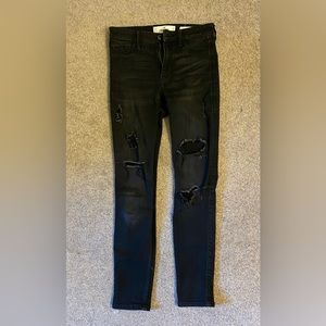 Black, skinny jeans, have rips